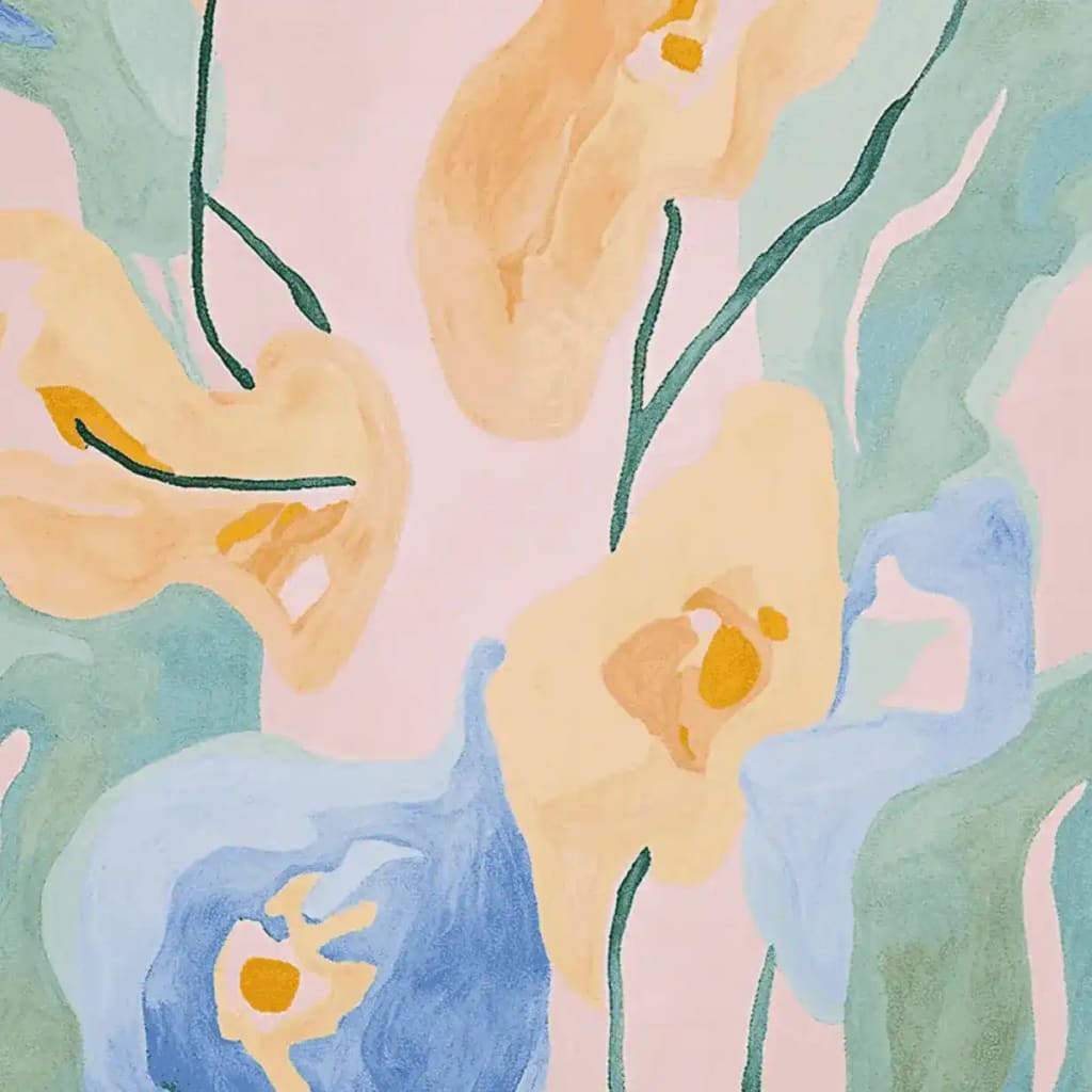 A close-up view of the Floral Rhythm Echo Hand Tufted Area Rug showcasing its contemporary design. The rug features abstract floral patterns in soft pastel colors, ideal for adding a touch of elegance to any living room. Made from high-quality wool, this rug is both stylish and durable, perfect for modern interiors seeking a unique, artistic flair.