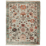 A beautifully hand-knotted area rug featuring an intricate floral design in warm tones, perfect for enhancing any living room space. This 8x10 wool rug showcases a harmonious blend of traditional patterns and vibrant colors, making it an ideal choice for those seeking a stylish floral rug.