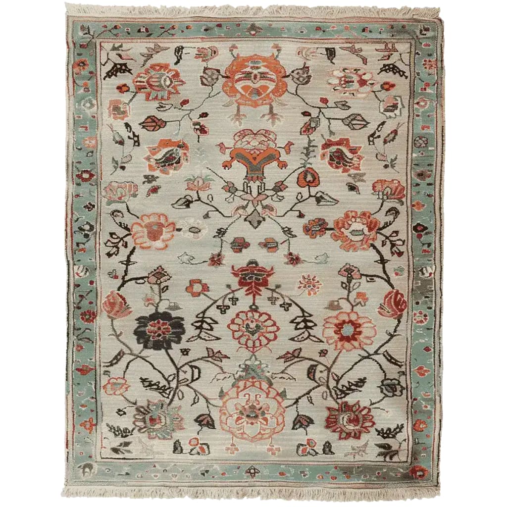 A beautifully hand-knotted area rug featuring an intricate floral design in warm tones, perfect for enhancing any living room space. This 8x10 wool rug showcases a harmonious blend of traditional patterns and vibrant colors, making it an ideal choice for those seeking a stylish floral rug.