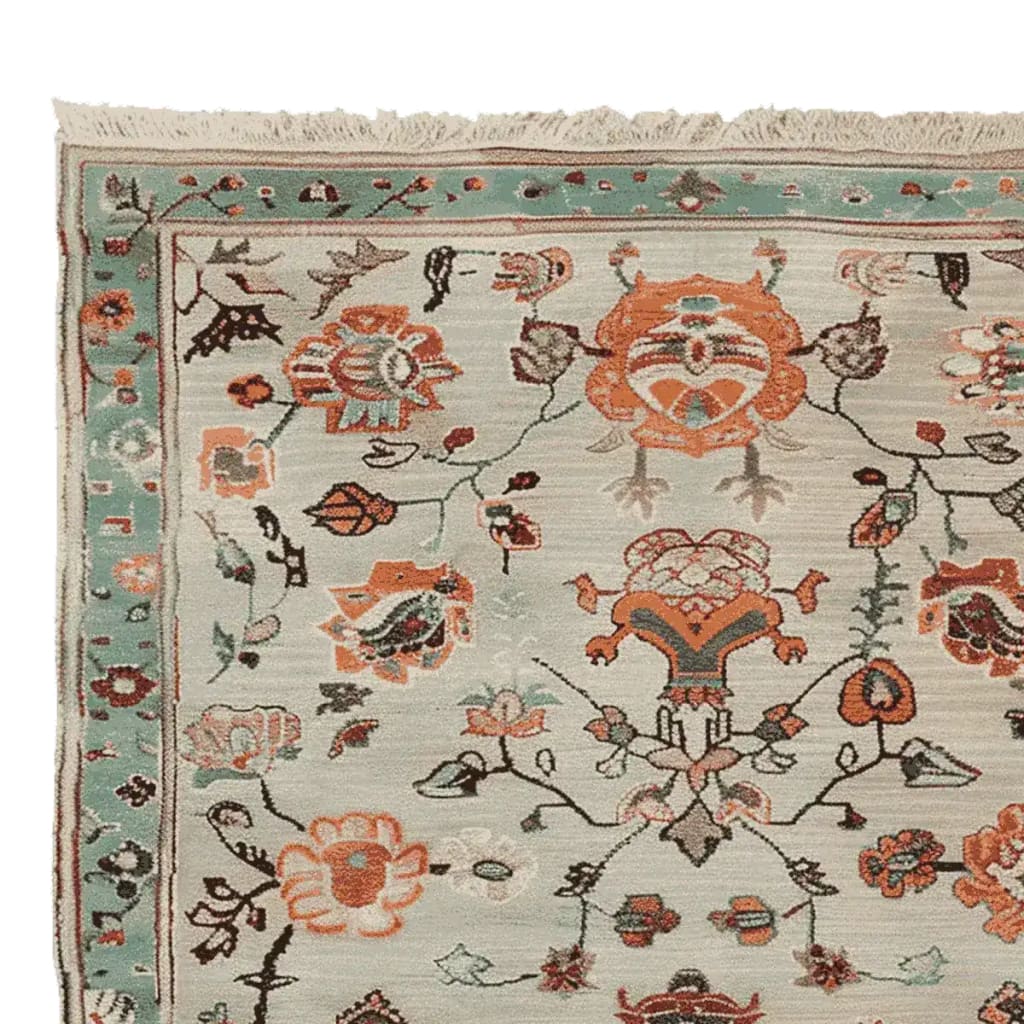 Close-up view of a Floral Scroll Harmony Hand Knotted Area Rug showcasing intricate floral designs in vibrant orange, teal, and beige tones. This 8x10 wool rug is perfect for adding an elegant touch to any living room.