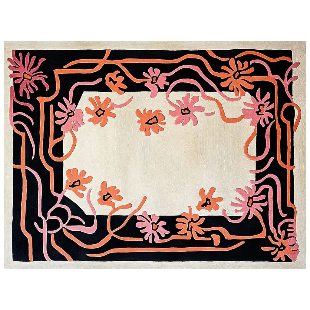 Top view of a Floral Spiral Hand Tufted Wool Rug featuring a vibrant abstract floral design in pink and orange against a black and cream background. This large area rug is perfect for adding a touch of elegance to your living room, showcasing the beauty of high-quality wool craftsmanship.