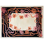 Top view of a Floral Spiral Hand Tufted Wool Rug featuring a vibrant abstract floral design in pink and orange against a black and cream background. This large area rug is perfect for adding a touch of elegance to your living room, showcasing the beauty of high-quality wool craftsmanship.