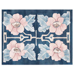 A beautifully hand-tufted wool area rug featuring a symmetrical floral design with pastel pink flowers and soft blue leaves against a deep blue background. Ideal for adding a contemporary touch to living room spaces, this 8x10 rug is perfect for those seeking stylish and cozy area rugs for living rooms.