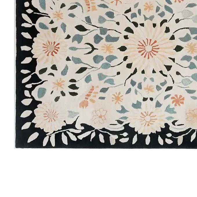 Close-up view of the Floral Symphony Hand Tufted Wool Rug, showcasing its intricate floral design with soft colors on a dark border, perfect for adding elegance to living room area rugs. Ideal as an 8x10 wool rug for a cozy and stylish living space.