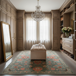 Luxurious closet with a chandelier, mirror, ottoman, and floral rug.