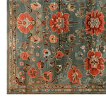 This elegant area rug showcases a beautiful floral tapestry design with vibrant red and pink flowers on a rich blue background. The vintage rug is crafted from high-quality wool, making it an ideal centerpiece for living room area rugs. The intricate pattern and warm colors add a touch of classic charm and sophistication, perfect for enhancing the aesthetic of any space.