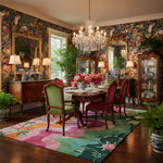 Floral Wavefront rug with pink and green swirls anchoring a lavish floral-papered dining room