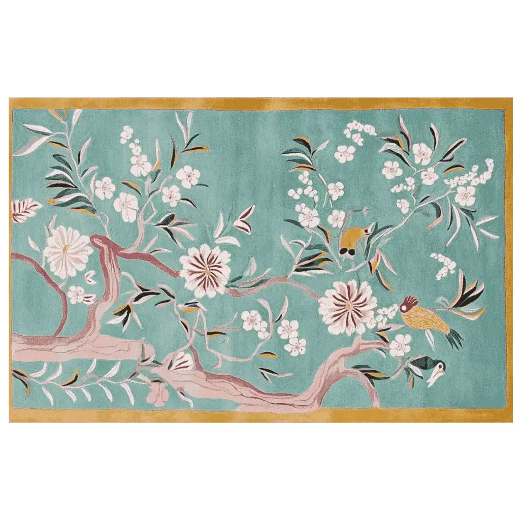 The Floral Whispers Sky Hand Tufted Rug is a stunning area rug perfect for large living rooms. Featuring a vibrant floral design with branches and blossoms, this wool rug adds elegance and warmth to any space. Ideal for those seeking area rugs for the living room.