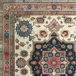 A beautifully detailed hand-knotted area rug showcasing a vintage Persian design. This floral rug features intricate patterns and rich colors, perfect for adding elegance to any living room. Ideal as a living room area rug, it measures 8x10 and provides a timeless aesthetic.