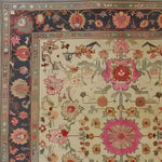 This Flower Enchantment Hand Knotted Area Rug showcases a beautiful blend of vintage charm and Persian artistry. The intricate floral patterns in vibrant colors elegantly cover the rug, making it a perfect addition to any large living room. This floral rug exudes a timeless appeal, ideal for those seeking both style and tradition in living room area rugs.