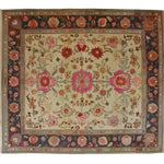 The Flower Enchantment Hand Knotted Area Rug showcases a vibrant floral design, perfect for adding a touch of elegance to large living rooms. This vintage rug, reminiscent of classic Persian rugs, features intricate patterns and rich colors, making it an ideal choice for those seeking stylish living room area rugs.