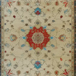 This exquisite Flowering Oasis Hand Knotted Area Rug showcases a vintage Persian design, perfect for large living room spaces. The floral rug features intricate patterns with a rich red central medallion surrounded by elegant floral motifs in shades of blue, beige, and other earthy tones, embodying the timeless charm of Persian rugs.