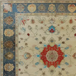 This exquisite hand-knotted area rug, perfect for large living rooms, features a vintage floral design reminiscent of Persian rugs. The intricate patterns and vibrant colors create a captivating centerpiece for any living room area, showcasing the elegance of a classic floral rug.