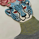 Flowers over Leopard Head Hand Tufted Accent Rug