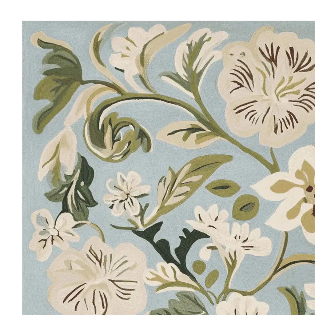 This beautiful area rug features an intricate floral design in soft greens and whites against a calming blue background. Perfect for those seeking a wool rug that adds a contemporary touch to any large living room. Ideal for creating a serene atmosphere, this hand tufted rug is a stylish choice for your rugs for living room collection.