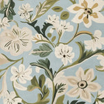 Vibrant Flowery Mood Hand Tufted Area Rug featuring a contemporary design with white and beige flowers on a soft blue background. This wool rug adds a touch of elegance, perfect for large living room spaces, enhancing any room with its stylish and modern flair.