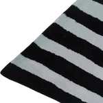 Close-up of the Flowing Illusion Black and Gray Wool Runner Rug, featuring bold black and gray stripes. Perfect for adding a contemporary touch to your living room, dining room, or as a stylish hallway runner rug. This vintage wool rug is also ideal for large living room areas and as a chic kitchen runner rug.