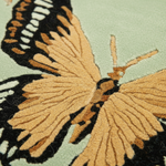 Close-up of a butterfly on rug