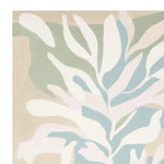 Close-up view of the Foliage Mirage Garden Hand Tufted Area Rug, showcasing its contemporary abstract leaf design in soft pastel hues. This wool rug is perfect for large living rooms, available in 8x10 size, adding a touch of elegance to any modern space.