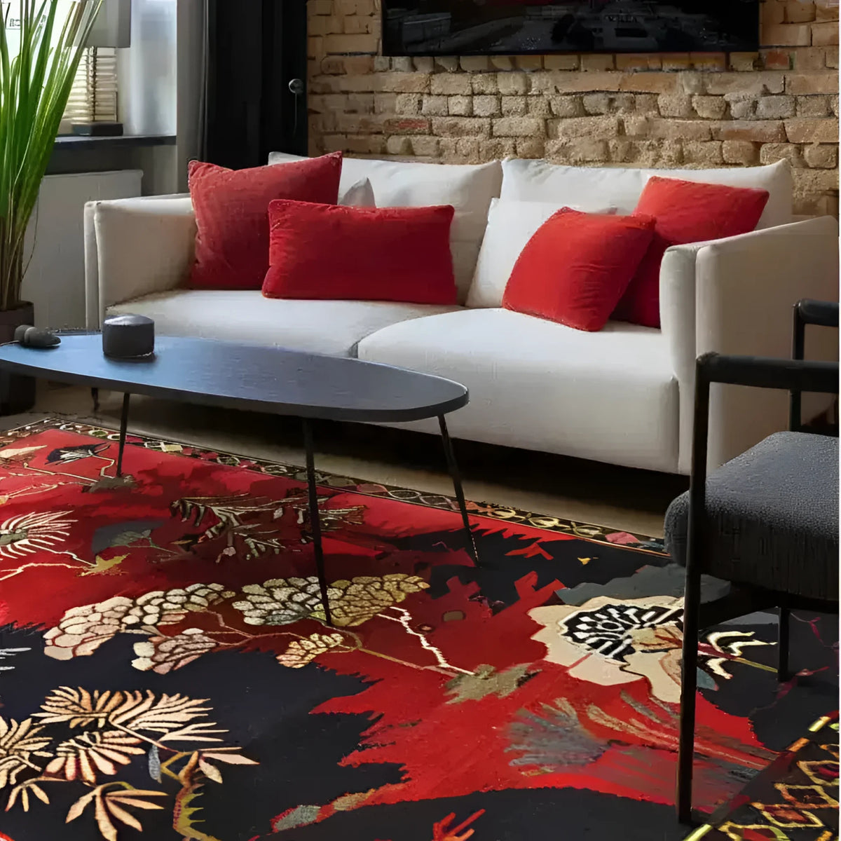 A vibrant and elegant area rug beautifully enhances a cozy living room setting. The wool rug, featuring a stunning floral design in rich reds and deep blues, complements the modern decor. Perfect for those seeking large area rugs for living room spaces, this piece combines the timeless appeal of Persian rugs with contemporary style.