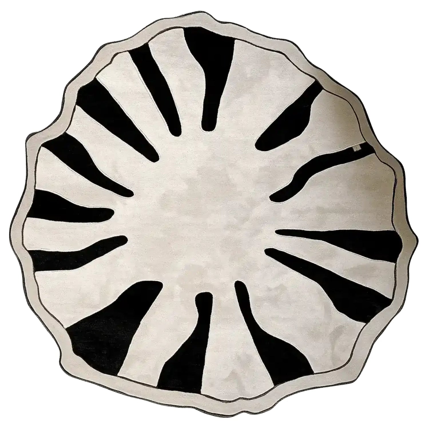 A striking round area rug in a contemporary design, featuring bold black and white abstract patterns resembling organic forms. This wool rug is perfect for large living rooms or as a centerpiece in an 8x10 space, offering a modern touch to any decor.