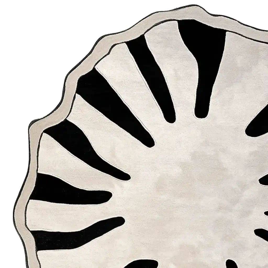 A contemporary hand-tufted area rug showcasing an abstract black and white design, reminiscent of a tiger pattern. Ideal for a large living room, this wool rug offers a stylish touch and is perfect for spaces needing an 8x10 or round rug.