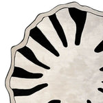 A contemporary hand-tufted area rug showcasing an abstract black and white design, reminiscent of a tiger pattern. Ideal for a large living room, this wool rug offers a stylish touch and is perfect for spaces needing an 8x10 or round rug.