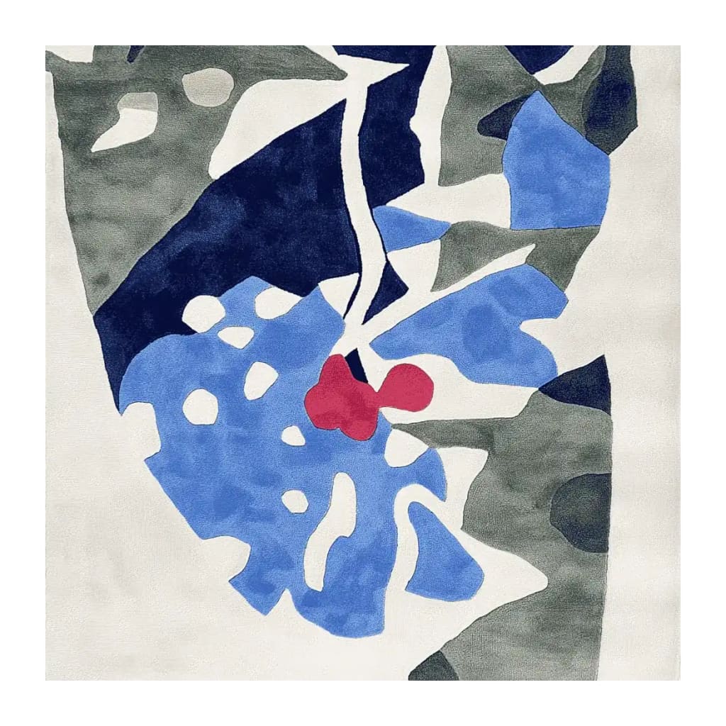 Top view of a contemporary, hand-tufted square area rug featuring an abstract design with bold blue, red, and gray shapes. This wool rug is ideal for adding a modern touch to living rooms, offering a unique blend of style and comfort.