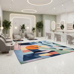 Modern interior design with a colorful geometric rug, chairs, and decorative plants.