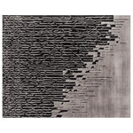 A contemporary hand-tufted area rug featuring an abstract design with a striking contrast of black and white lines. This wool rug is perfect for adding a modern touch to living room spaces, making it an ideal choice for those seeking stylish and artistic rugs for living rooms.
