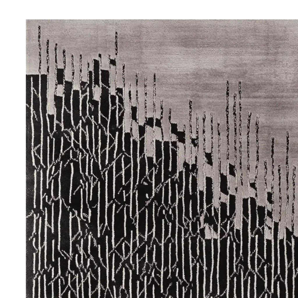 Contemporary area rug featuring an abstract black and gray design, perfect for modern living room spaces. This wool rug showcases a unique pattern blending geometric lines and organic shapes, ideal for those seeking stylish and artistic rugs for living room decor.