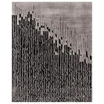 Contemporary area rug with an abstract black and white design, perfect for adding a modern touch to your living room. This wool rug features a striking pattern, ideal for those seeking stylish and unique living room area rugs.