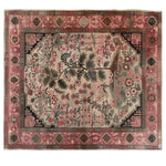Fuchsia Harmony Knotted Wool Area Rug featuring an intricate floral design with vibrant pink and earthy tones. Perfect for adding a touch of elegance to your living room, this 8x10 floral rug creates a warm and inviting atmosphere.