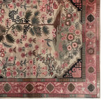 A beautifully designed Fuchsia Harmony Knotted Wool Area Rug, showcasing intricate floral patterns in vibrant colors. Perfect as a centerpiece for area rugs in the living room, this 8x10 rug combines elegance with a touch of nature.