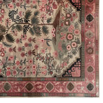 A beautifully designed Fuchsia Harmony Knotted Wool Area Rug, showcasing intricate floral patterns in vibrant colors. Perfect as a centerpiece for area rugs in the living room, this 8x10 rug combines elegance with a touch of nature.
