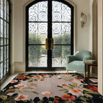 A stunning Garden Bouquet Hand Tufted Wool Rug adding elegance to a living room. This large area rug, perfect for an 8x10 space, features vibrant floral patterns, making it an ideal square area rug for any living room. The intricate design and quality wool material highlight the beauty of floral rugs.
