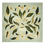 A beautifully designed square area rug with an abstract floral pattern in shades of green and beige, perfect for adding a contemporary touch to your living room. This wool rug is hand tufted, offering a soft texture and elegant style.
