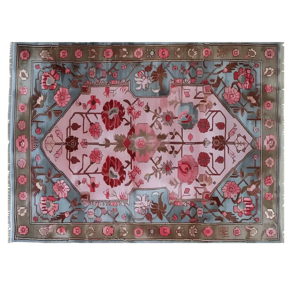 An enchanting area rug featuring a vibrant floral design with rich pink and red flowers on a soft pink and blue background. Ideal for adding a touch of elegance to living room area rugs.