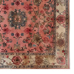 The Garden of Ages Knotted Wool Rug showcases a vibrant floral design, perfect for adding elegance to any living room. This area rug features intricate patterns with a rich color palette, making it an ideal choice for those seeking stylish living room area rugs.