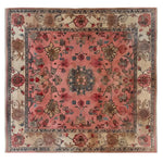 Top view of the Garden of Ages Knotted Wool Area Rug showcasing its intricate floral patterns and rich colors, ideal for living room decor as a floral rug.