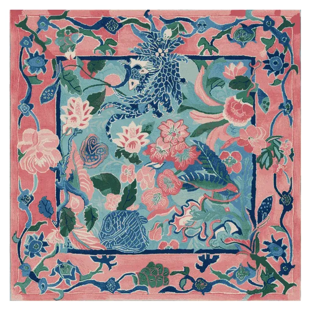 Vibrant and colorful Garden of Legends hand tufted area rug featuring an intricate floral design with shades of blue, pink, and green. This square area rug is perfect for adding a touch of elegance to any living room. Made from high-quality wool, it's a large living room rug that combines both beauty and comfort.
