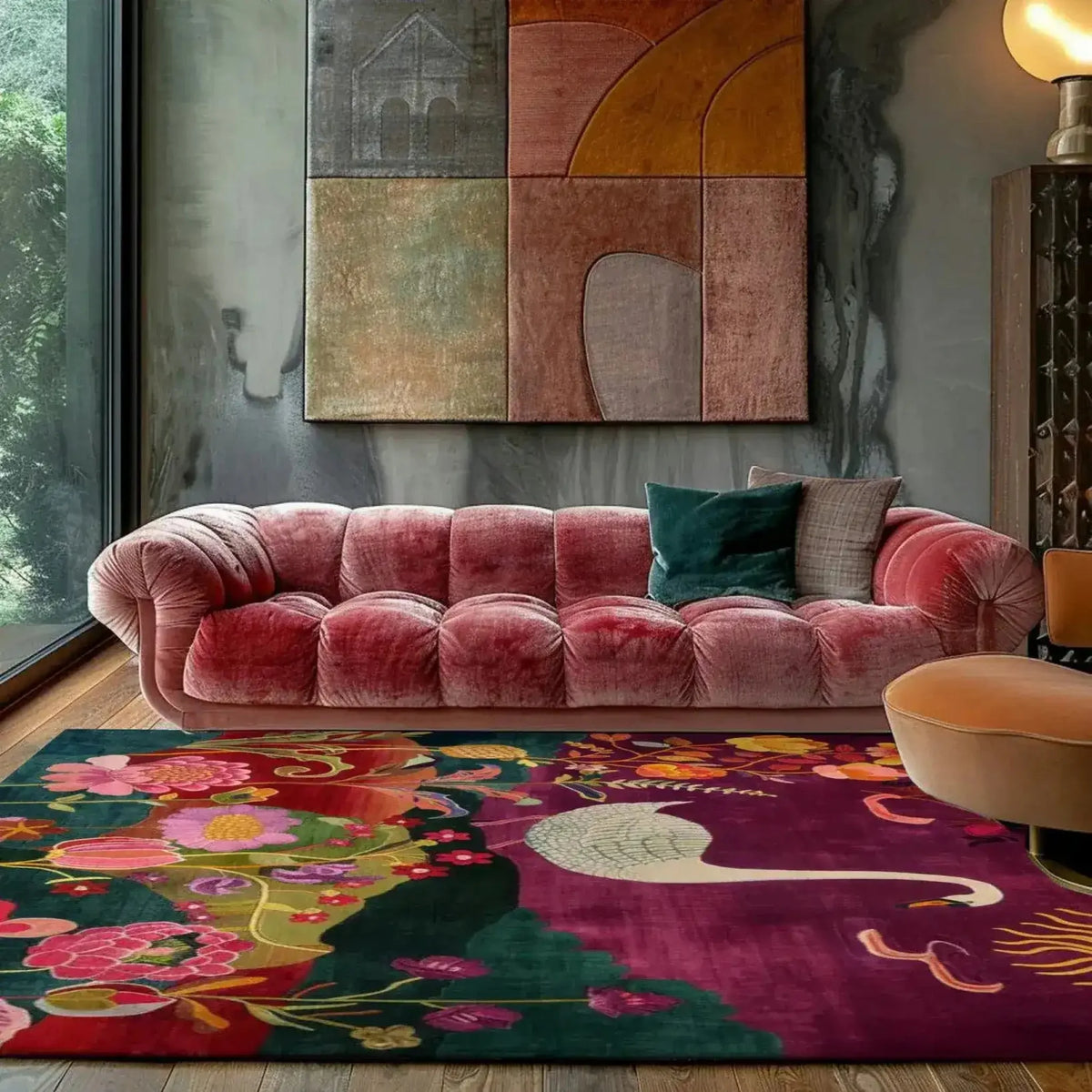 Luxurious wool hand-knotted area rug with vibrant floral and abstract patterns, perfect for adding elegance to a bedroom or living room setting. The colorful design complements the plush pink sofa, creating a serene and stylish atmosphere.
