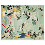 Garden Song Hand Tufted Area Rug featuring a vibrant design with detailed floral and bird motifs on a soft green background. This wool rug is an ideal choice for those seeking area rugs for living room spaces, adding a touch of elegance to large living room rugs collections.