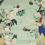 This exquisite Garden Song Hand Tufted Area Rug showcases a vibrant design featuring lush floral patterns and elegant birds against a soft green background. Perfect for adding a touch of nature-inspired beauty to large living rooms, this wool rug offers both style and comfort.