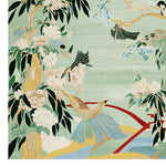 A beautifully detailed area rug featuring a vibrant design with birds and blooming flowers against a light green background. This wool rug is perfect for adding a touch of nature to your living space. Ideal for large living room areas, this hand-tufted rug combines elegance and durability.