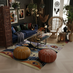 Cozy living room with blue sofa, wooden ottomans, and funky rug.