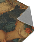 Gemini Zodiac Vintage Accent Rug dark corner fold view with navy starry background, warm tan classical gowns, and orange rose botanical accents