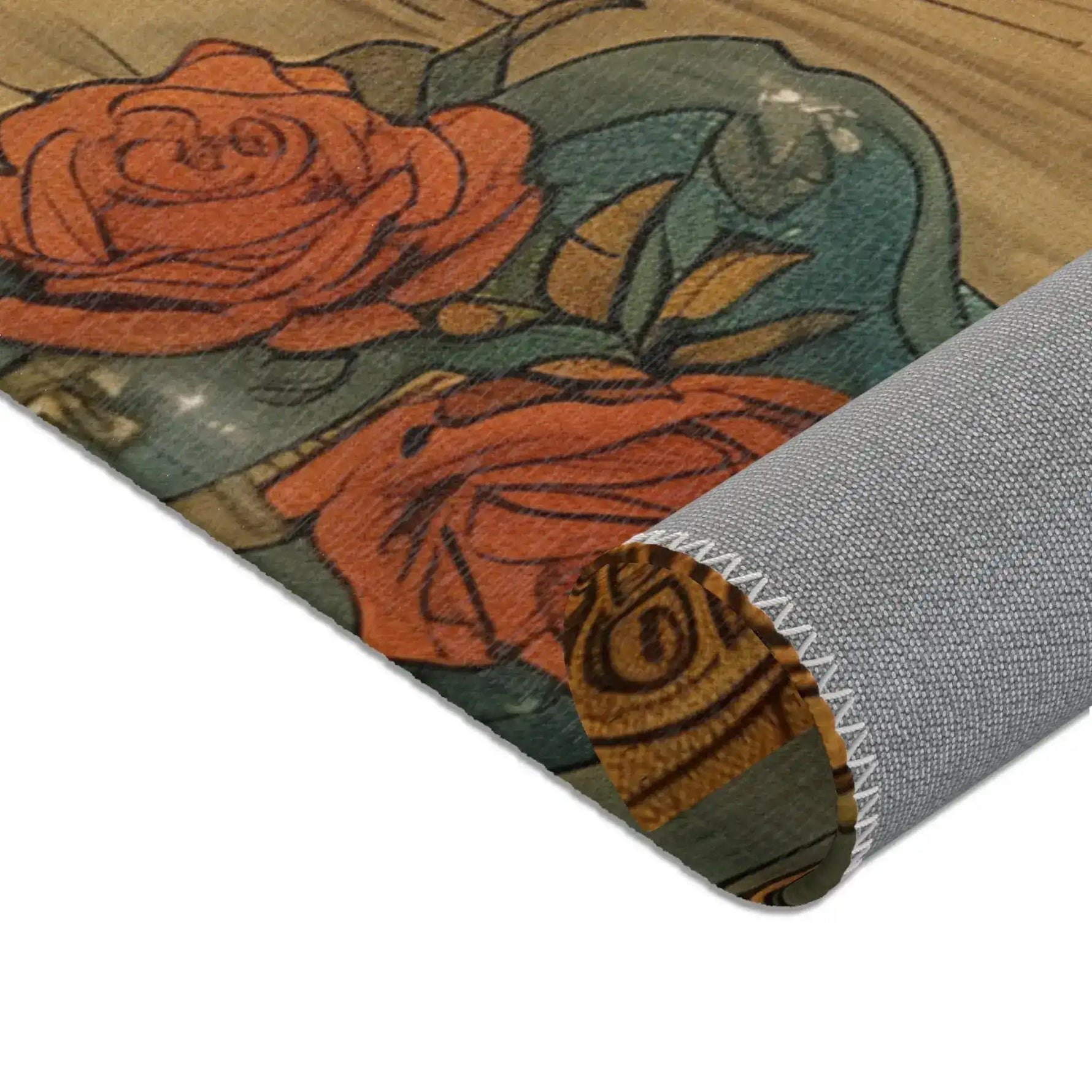 Gemini Zodiac Vintage Accent Rug close rolled corner detail of orange roses and teal botanical elements on warm ivory ground
