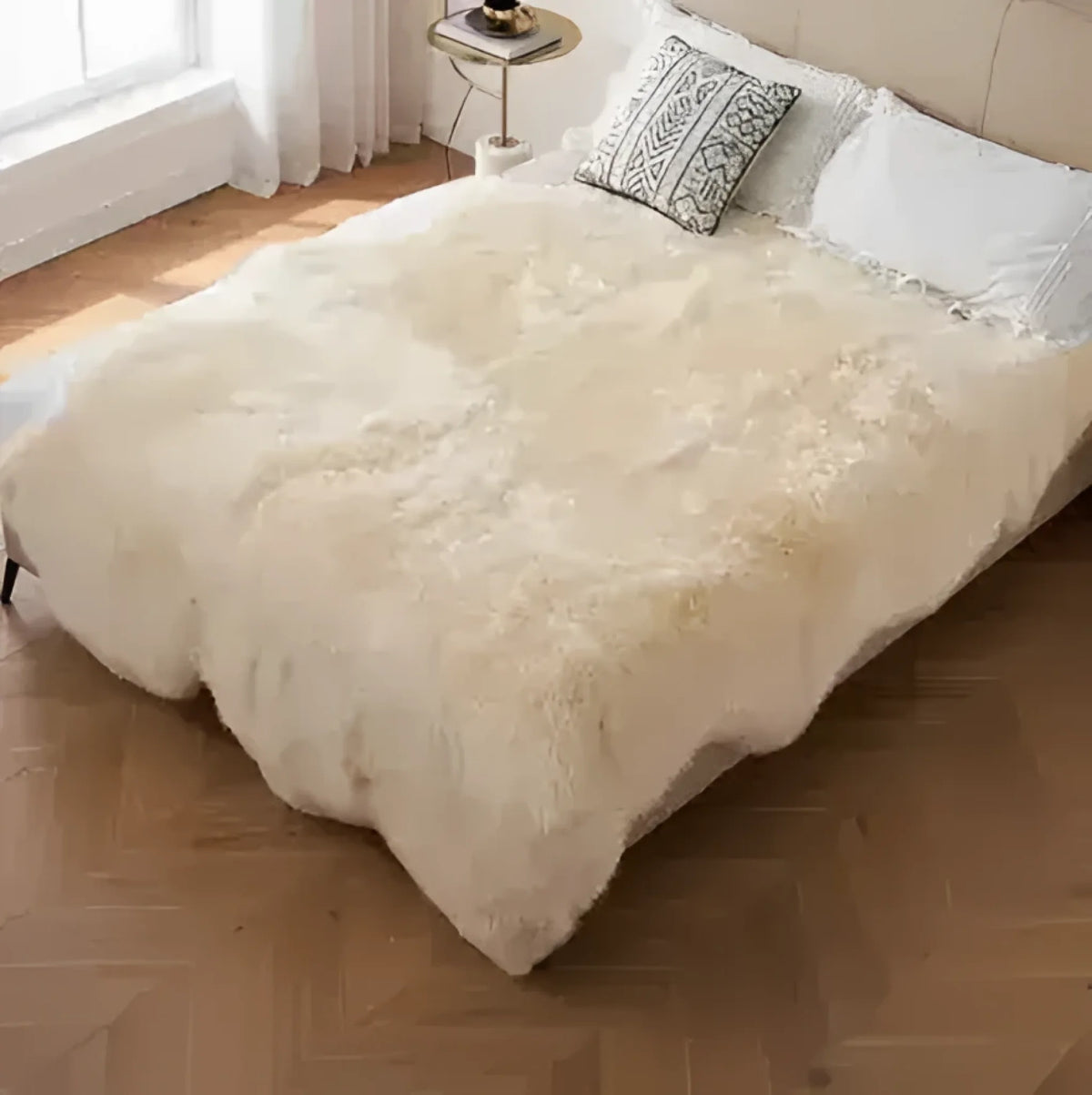 Cozy and luxurious genuine sheepskin wool area rug draped over a bed in a stylish bedroom setting. This versatile area rug adds warmth and elegance, perfect for living room area rugs.
