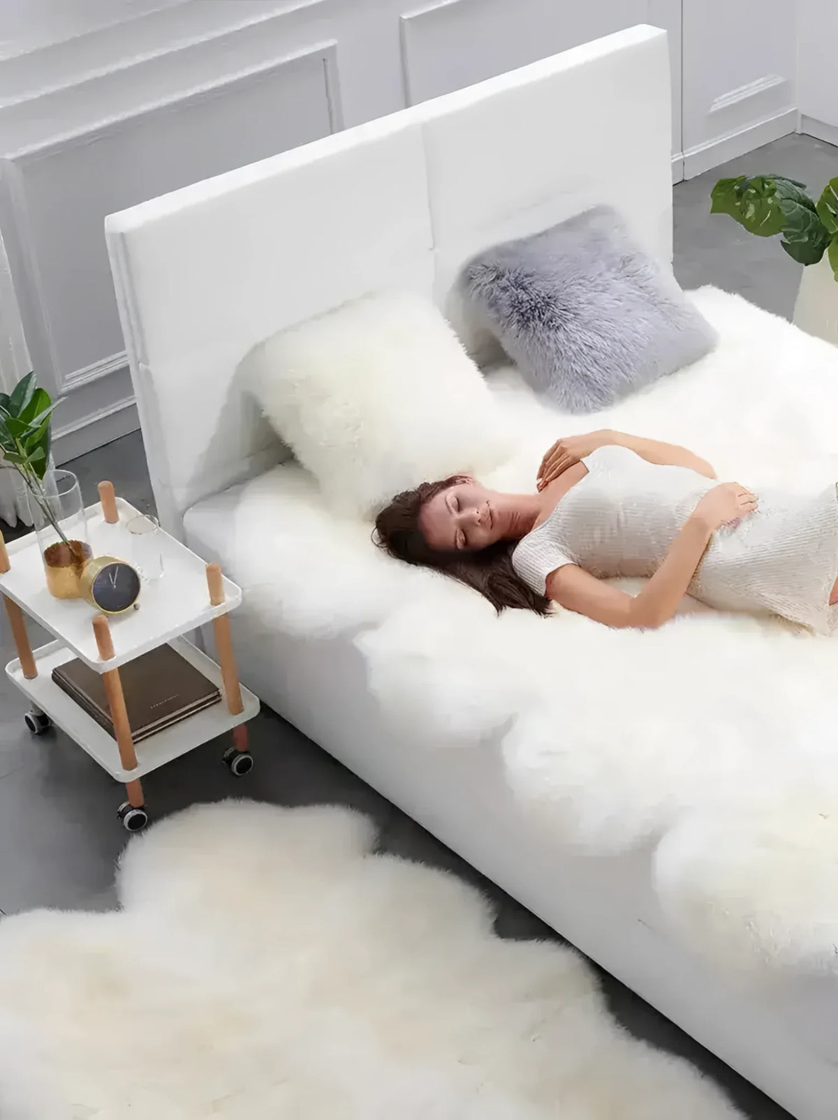 Luxurious genuine sheepskin wool area rug creating a cozy setting in a modern bedroom. The area rug, perfect for living room spaces, adds a touch of elegance and warmth, enhancing comfort and style in your home.